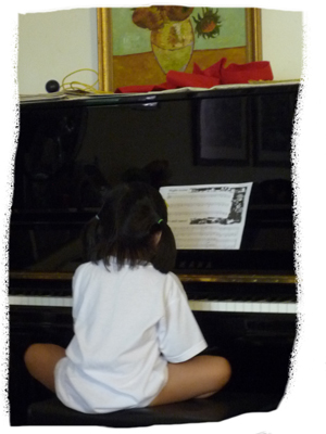 preschooler-practising-piano